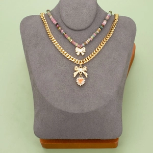 Layered 18k gold-plated necklaces with beaded choker and heart bow pendant
