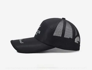 Detail of breathable black mesh baseball cap featuring side letter embroidery and sport brim