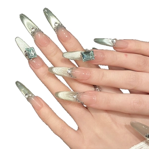 Luxury long almond silver cat-eye press-on nails with blue square rhinestones and gems
