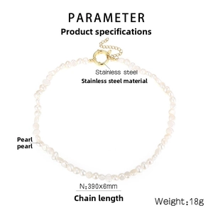 Close-up of baroque pearl necklace with golden stainless steel clasp detail