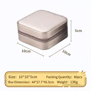 Portable champagne gold jewelry travel box with zipper closure and dimensions 10x10x5cm