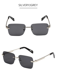 Detalle de gafas de sol cuadradas sin montura con varillas de metal plateado