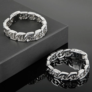 Men's punk hollow cross 316L stainless steel bracelet displayed on a luxury black gift box