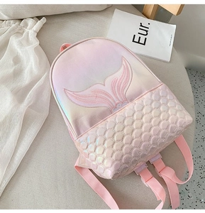 Detail of holographic pink mermaid backpack with fish tail embroidery and scale quilting