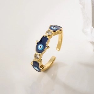 Adjustable 18K gold plated Hamsa Hand ring with blue enamel and sparkling zircon accents