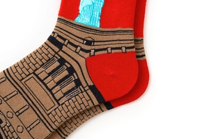 Detailed macro view of landmark embroidery on cotton knit crew socks with vibrant colors