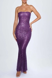 Close-up of shimmering purple sequins on a strapless slim-fit evening mermaid gown