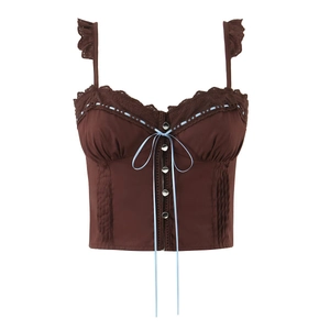 Brown vintage lace trim camisole with blue ribbons and button details on white background