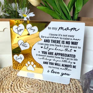 Detail of custom acrylic Mother's Day plaque with golden mirror hearts and engraved poem