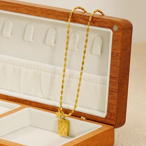 Golden stainless steel checkerboard square pendant necklace with small star on bead chain