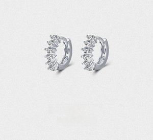Macro view of S925 sterling silver hoop earrings with clear cubic zirconia inlays