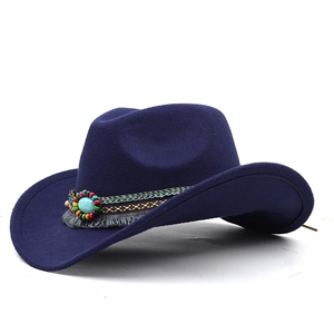 Detail of navy wool cowboy hat featuring bohemian beaded band and turquoise stone accent