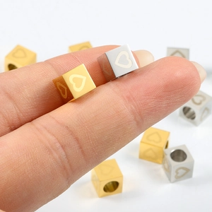Polished stainless steel cube beads with heart engraving in gold and silver finish