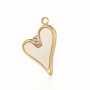 Detail of a gold heart pendant with white enamel inlay and small zircon accents