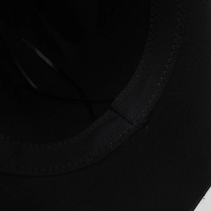 Detail of wool felt hat interior featuring adjustable sweatband and fine stitching