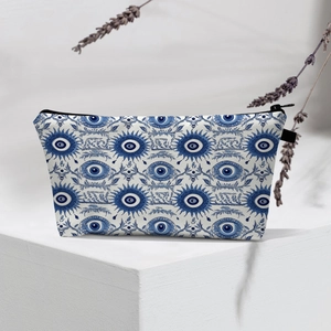 Detail of waterproof Evil Eye makeup bag with canvas texture and zipper closure