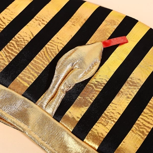 Egyptian Pharaoh hat with gold and black stripes and red snake detail for party costumes
