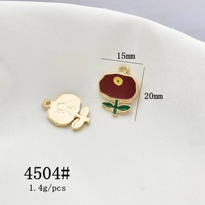 Detailed view of red tulip flower alloy pendants with 15mm by 20mm dimensions
