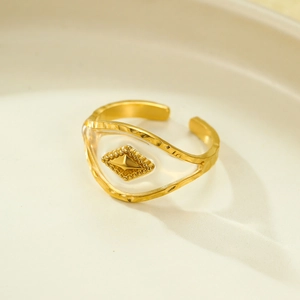 Vintage golden stainless steel open ring featuring a white evil eye shell inlay design