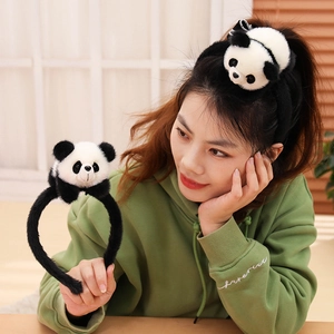 Cute panda plush headband featuring a soft black and white stuffed toy decoration