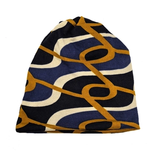 Versatile double-sided knit beanie scarf with navy and yellow geometric jacquard patterns