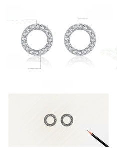 Détail de boucles d'oreilles en argent 925 avec pierres de zircone 5A serties à la main