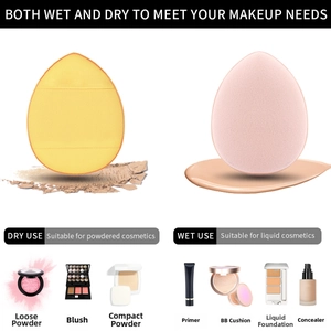 Detailed macro view showing texture of pink and yellow mini makeup sponges for dry and wet use