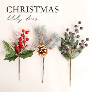 Three assorted Christmas picks with red berries, pine cones and snowy pine needles