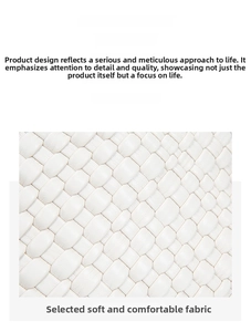 Close-up detail of the premium white hand-woven leather texture on the bucket bag