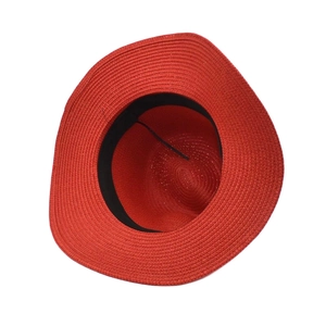 Close-up of red straw sun hat interior with black sweatband and adjustable drawstring
