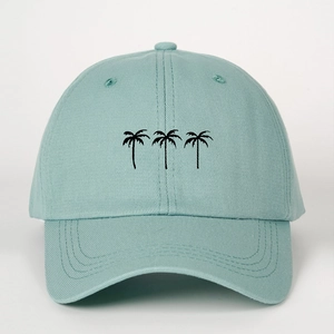 Detailed close-up of mint green baseball cap with three palm trees embroidery design