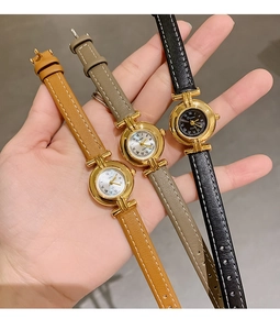 DINIMI women's vintage quartz watch with Roman numeral dial and thin leather straps