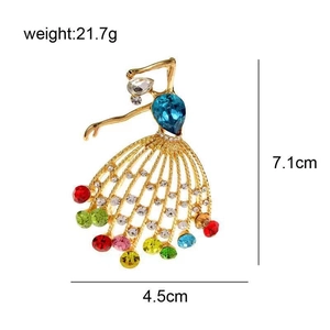 Detail of vintage ballet girl brooch showing 7.1cm height and 4.5cm width with crystals