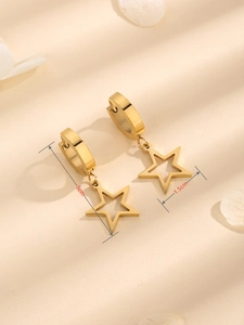Detailed view of gold hollow star huggie earrings with 3cm length and 1.5cm width dimensions