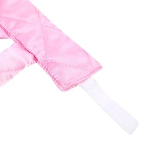 Detail of pink quilted heatless hair curler with white elastic band connection