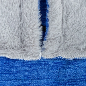 Winter cycling hat with blue corduroy fabric and warm grey faux fur lining detail