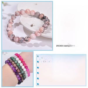 Detail of 8mm pink zebra stone stretch bracelet showing beads and size specifications