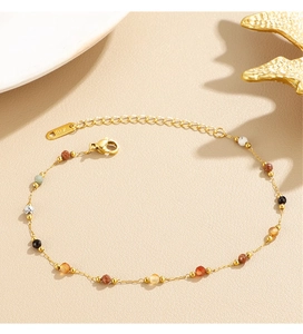 Close-up of 18K gold plated chain with colorful natural stones and lobster clasp