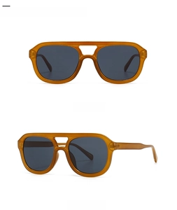 Front and 45-degree angle view of amber square sunglasses with a retro double bridge
