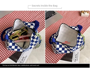 Detail of blue checkerboard Boston bag interior showing spacious main compartment