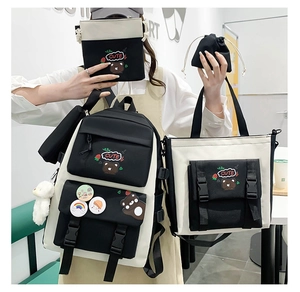 Detailed four-piece nylon backpack set including tote and crossbody bags with bear motifs
