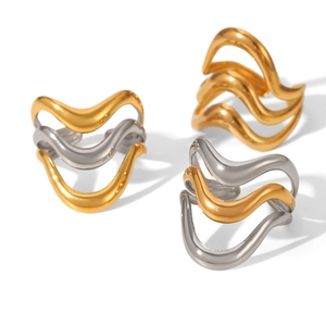 Minimalist wave shaped stainless steel rings in gold and silver two-tone metallic finish