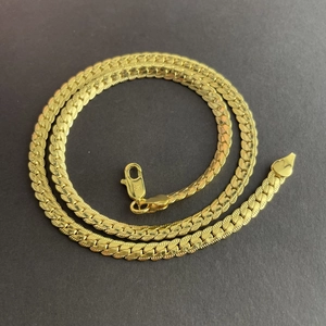 5mm 18K gold plated curb chain necklace with lobster clasp on dark background