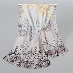 Detail of floral peony print on lightweight semi-transparent chiffon scarf for women