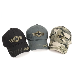 Three tactical baseball caps with star embroidery and U.S. Army label on solid background