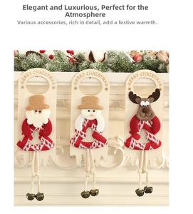 Detailed view of handcrafted Christmas wood hangers with bells and plush holiday characters