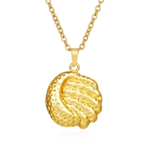 Macro shot of 18K gold plated necklace showing detailed textured round pendant