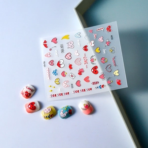 Hollow heart nail art stickers with cute cartoon animal patterns and love phrases