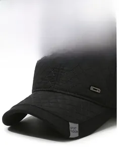 Detail of black baseball cap showing diamond stitching and Sport Fashion label
