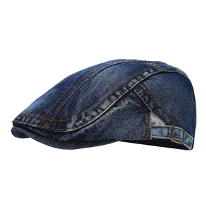 Classic washed dark blue denim flat cap with vintage bronze buckle and distressed finish